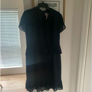 Beautiful black dress. Looks like two pieces but it’s one.